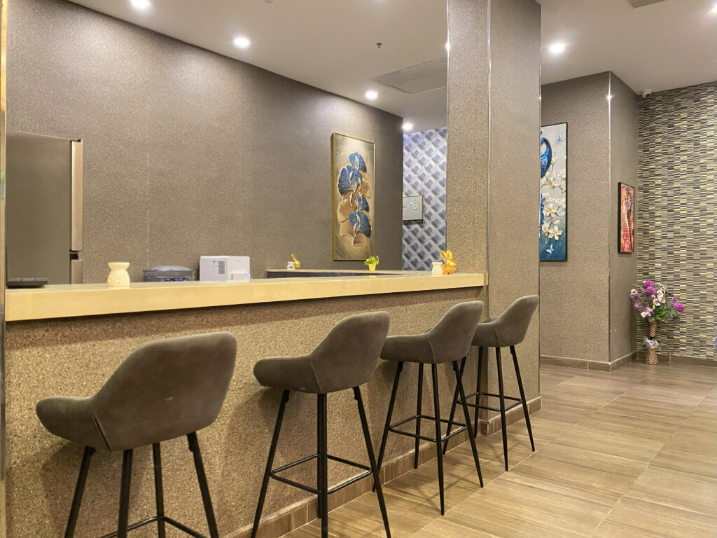 Bar and seating area at Aroma Wellness & Spa, Livingston Hotel Sandakan for guests waiting or relaxing