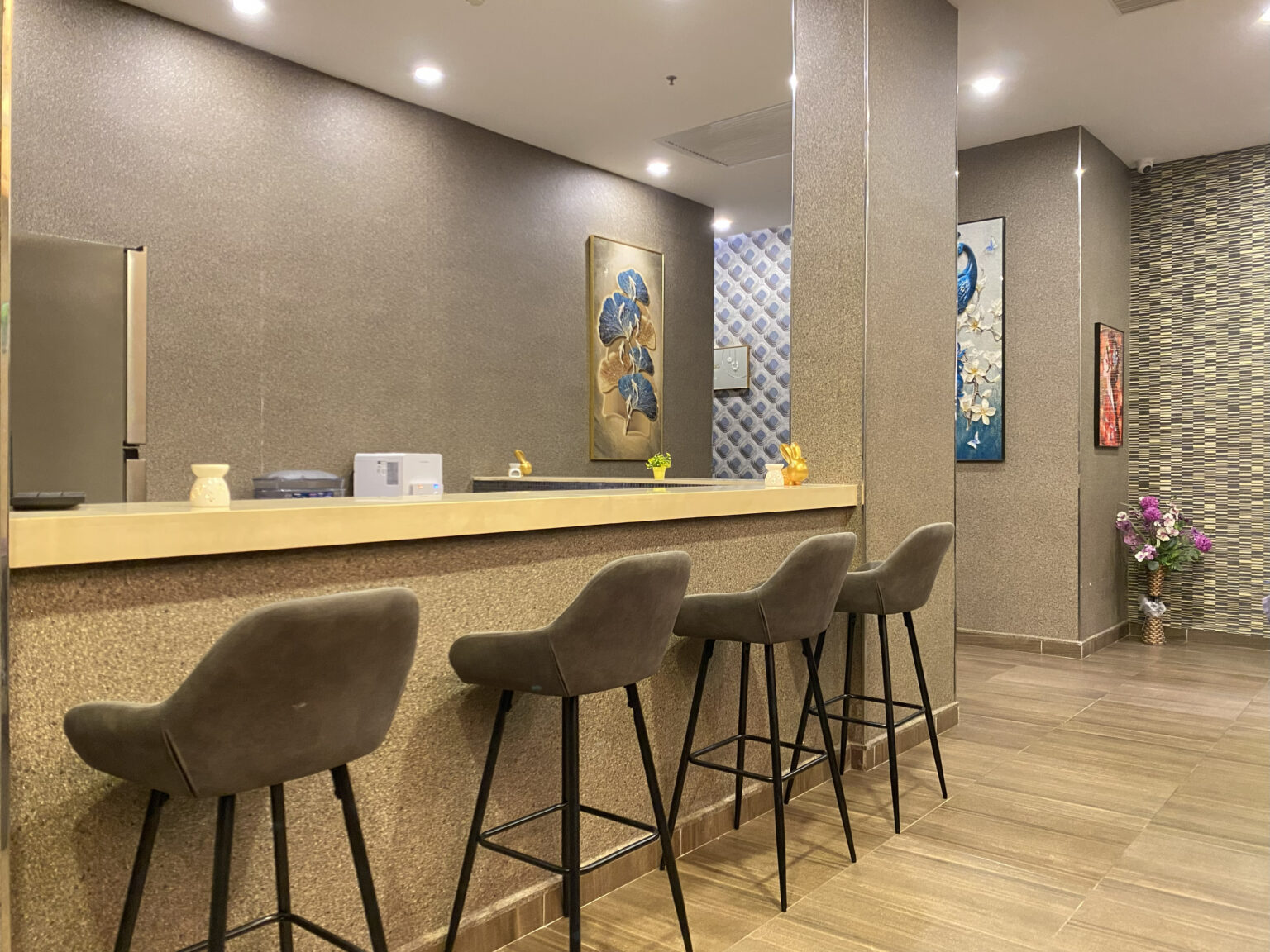 Bar and seating area at Aroma Wellness & Spa, Livingston Hotel Sandakan for guests waiting or relaxing