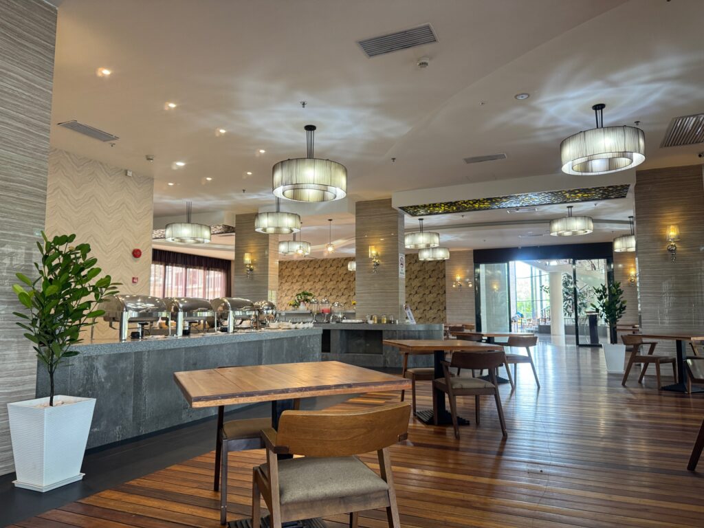 Buffet area of The Living Delight Restaurant at Livingston Hotel Sandakan showing chafing dishes and food displays